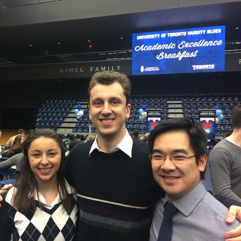 U of T Engineering graduate student Anthony Nassif (centre) was honoured at the Varsity Blues Academic Excellence Breakfast as a member of the Mountain Biking team. His twin sister Christine Nassif (also a U of T Engineering grad) and Professor Edmond Young (MIE) were there to support him. 